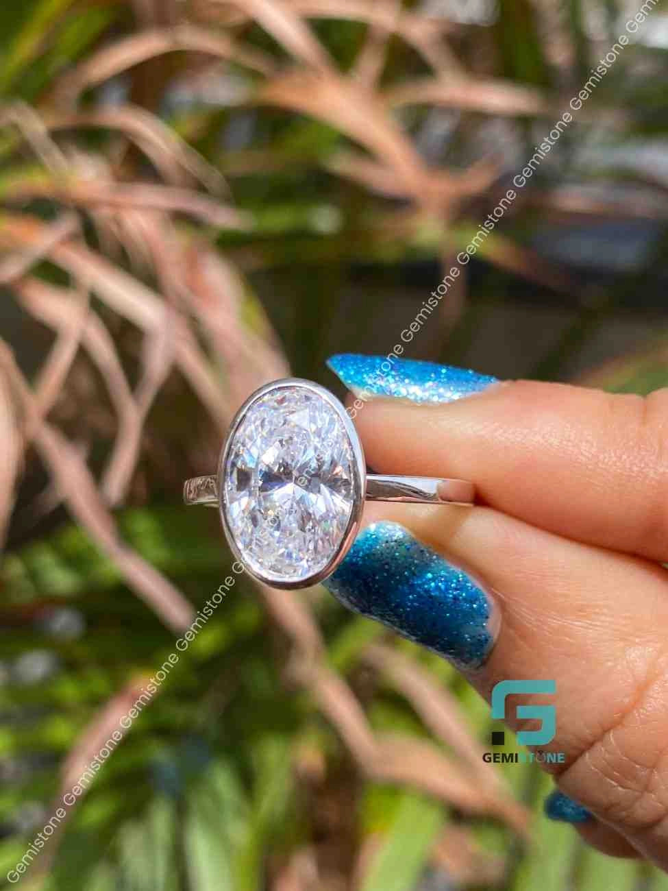 Moissaniite Oval Cut Bezel Set Ring