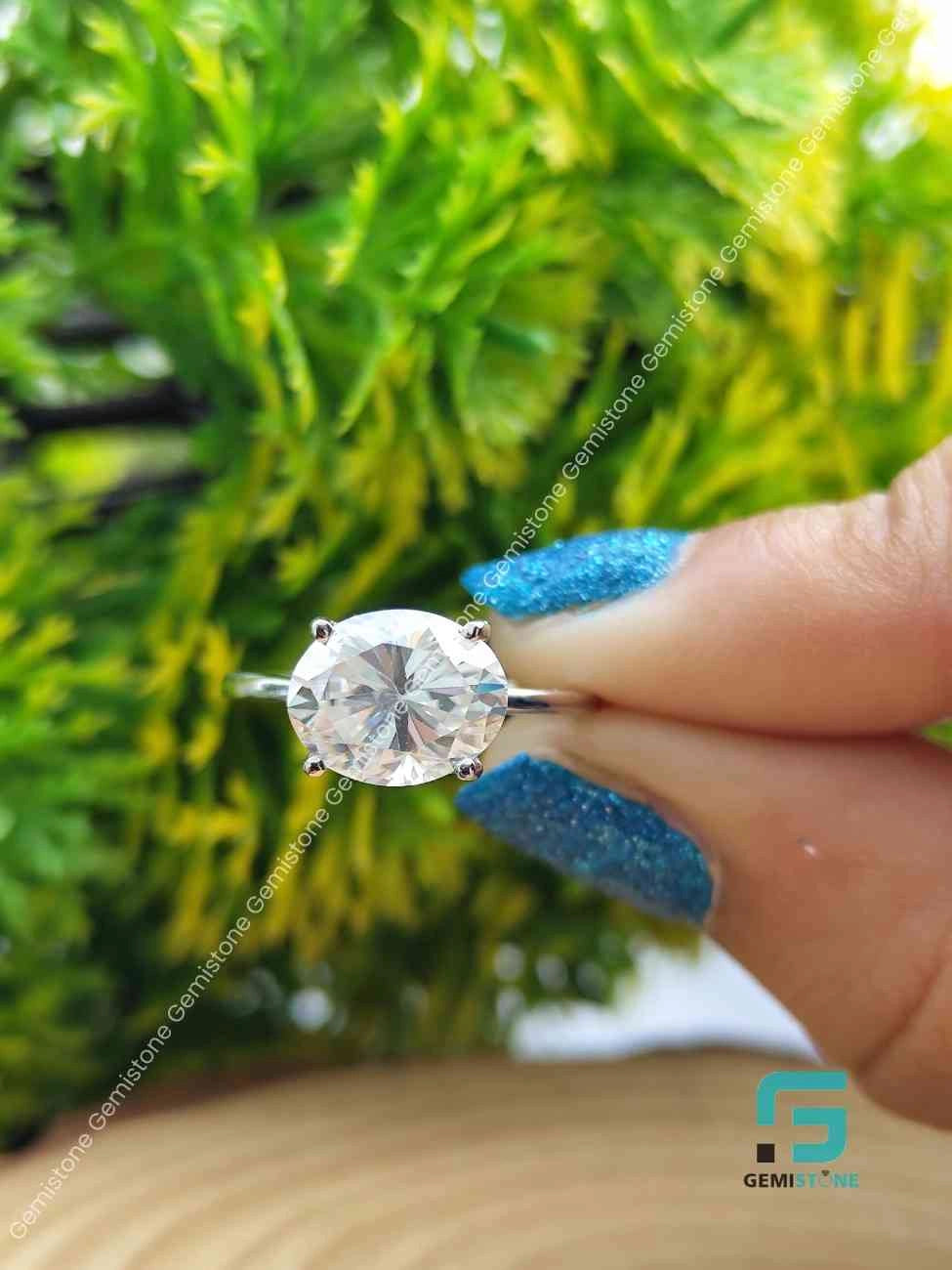 Moissanite_East_West_Emerald_Cut_Ring