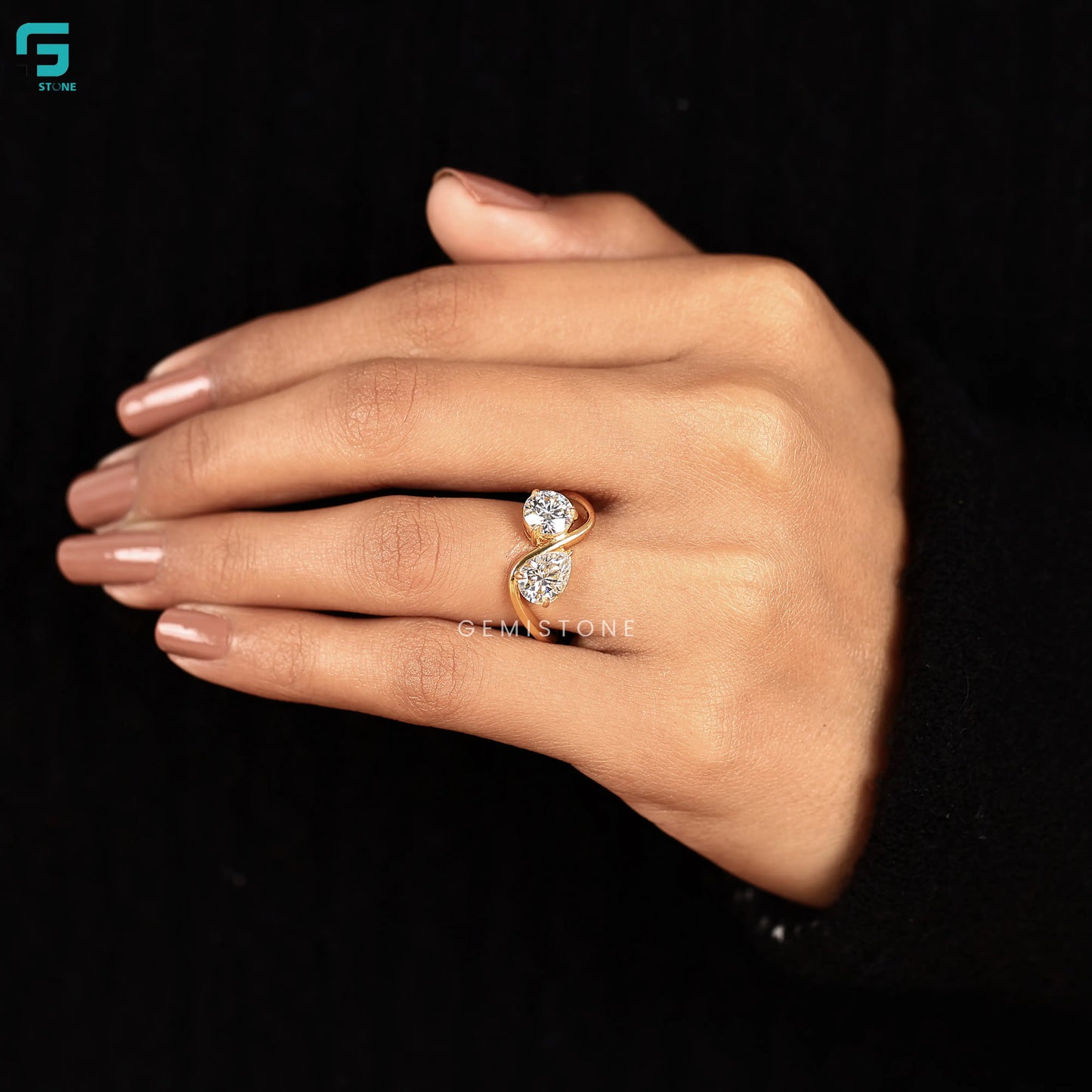 By pass Pear And Round Two Stone Engagement Ring 