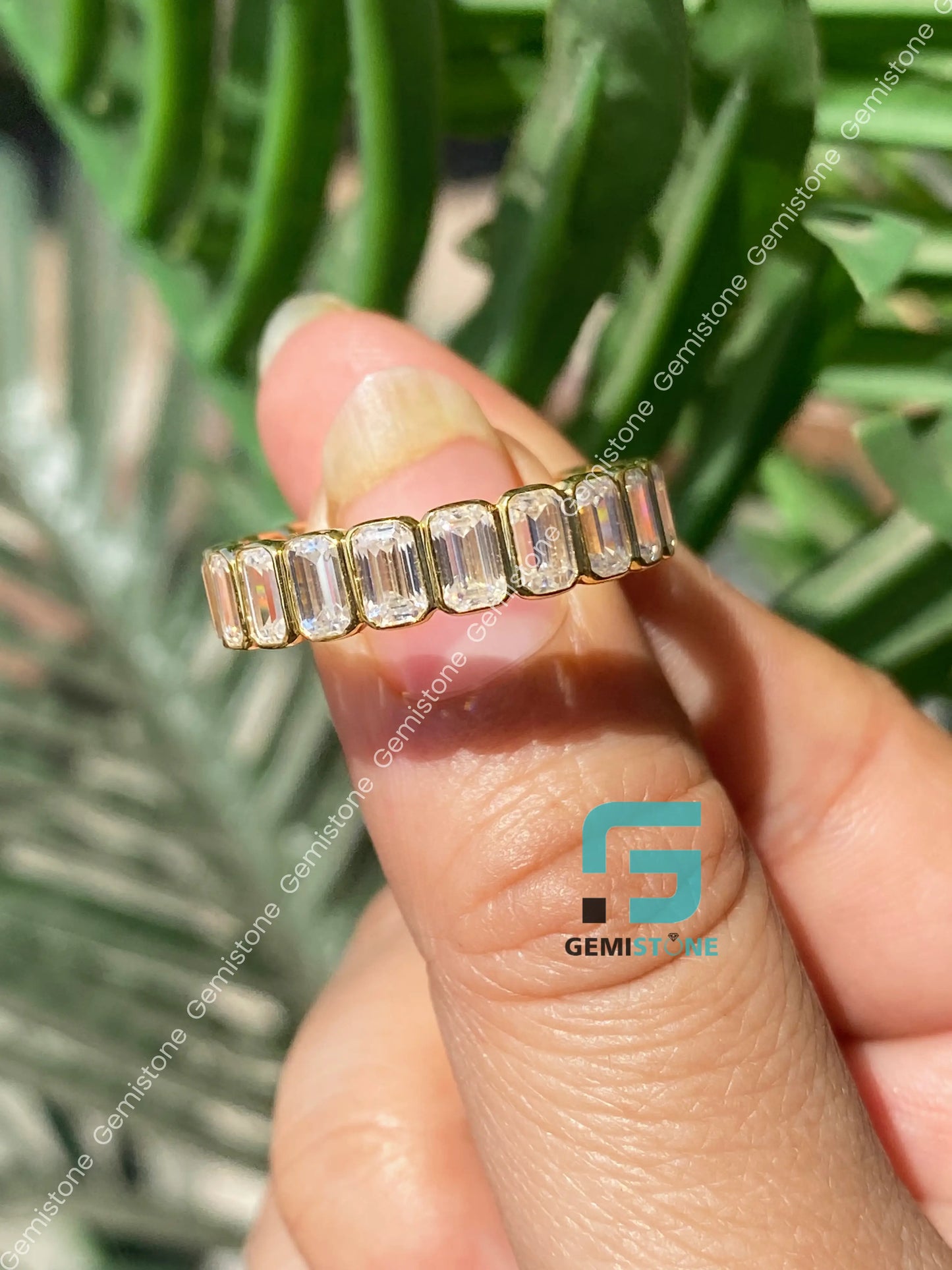 Stunning Emerald Bezel Band
